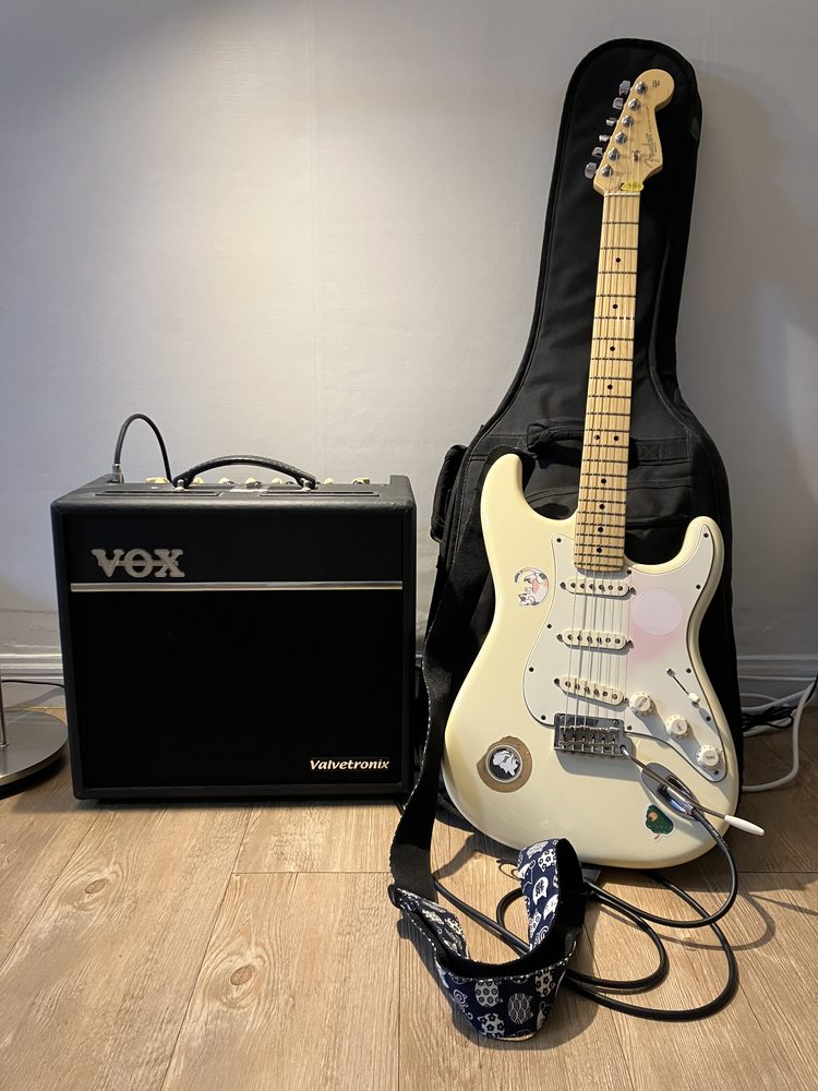 Photo of my 12-year-old electric guitar and amp